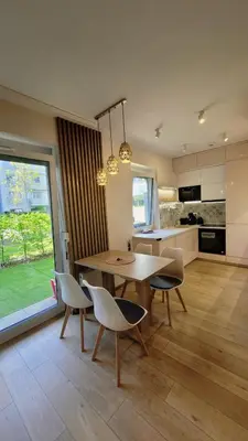 Kuchnia lub aneks kuchenny w obiekcie Green Terrace Big Family Apartment