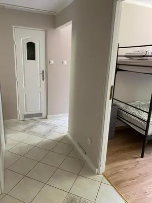 Łóżko lub łóżka w pokoju w obiekcie Apartament w Zdroju