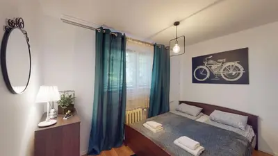 Łóżko lub łóżka w pokoju w obiekcie Kotlarska 7 TectumApartments