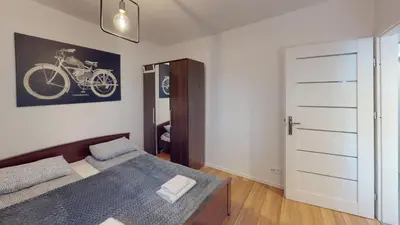Łóżko lub łóżka w pokoju w obiekcie Kotlarska 7 TectumApartments